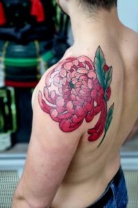 Chrysanthemum tattoo by Emil Klein Tattoo, Groningen