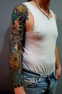 Chrysanthemum tattoo by Emil Klein Tattoo, Groningen